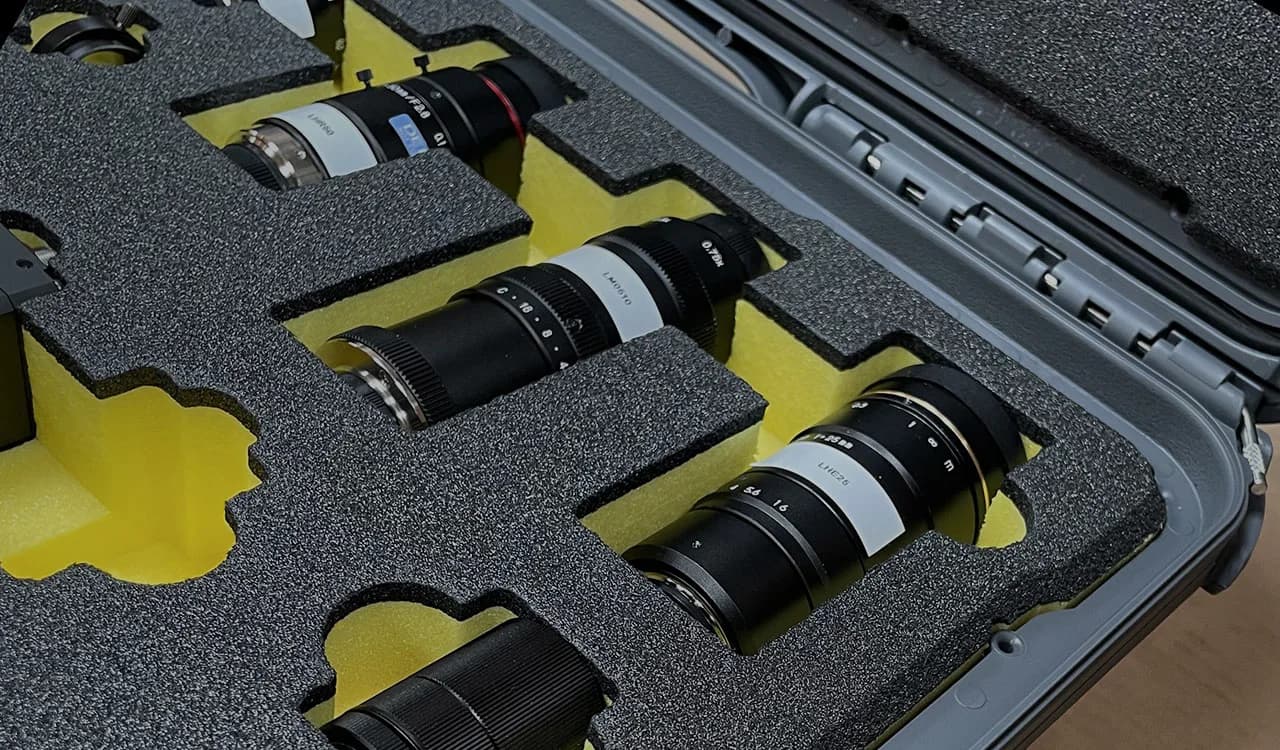 Camera lenses protected in a custom foam insert case