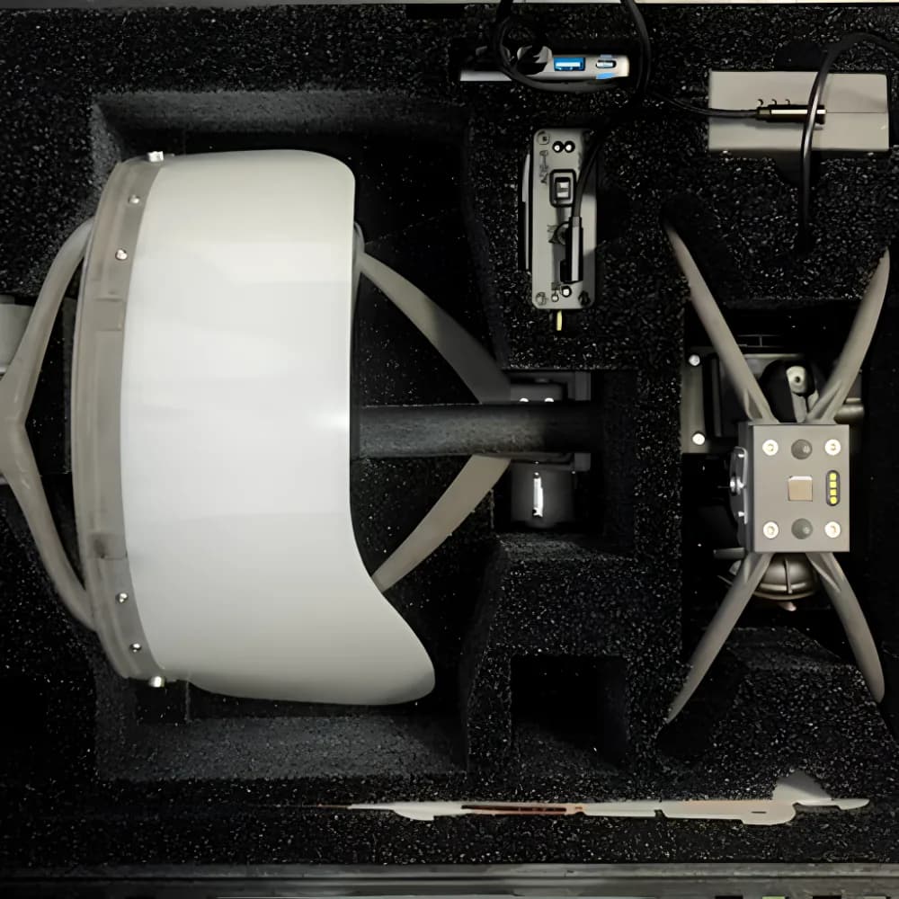 Drone components protected in a custom black foam insert