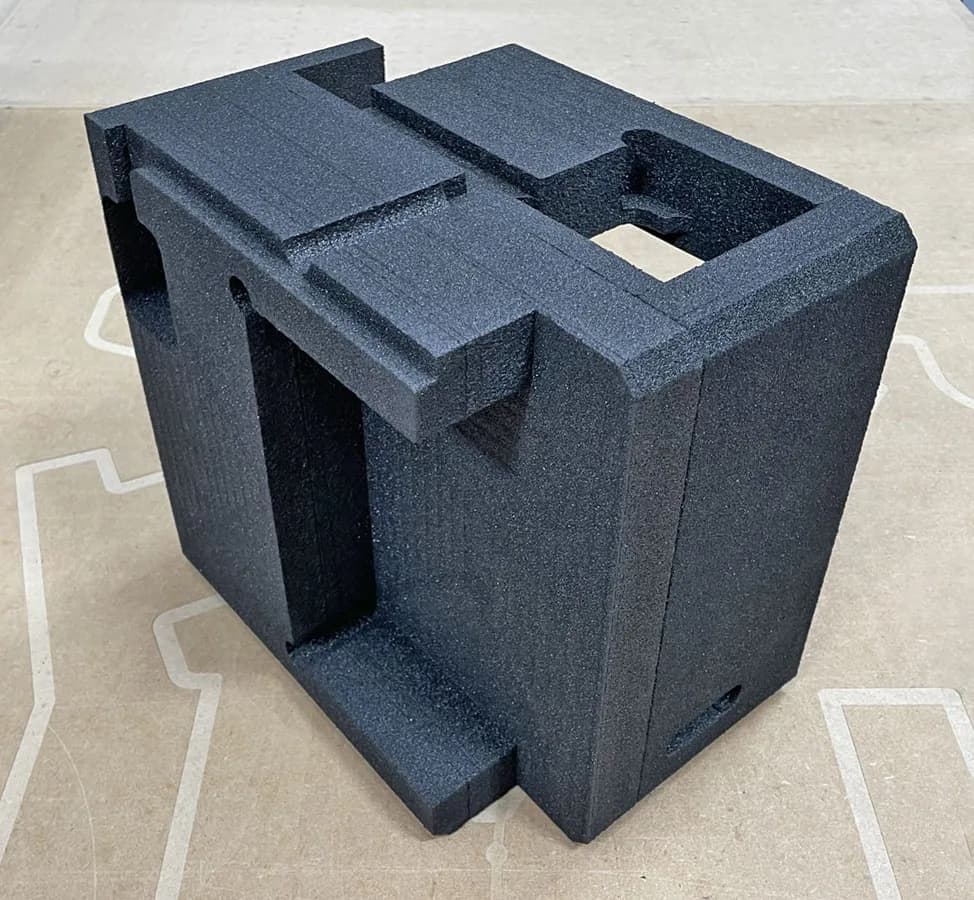 Specialist black foam block with custom shaped cutouts