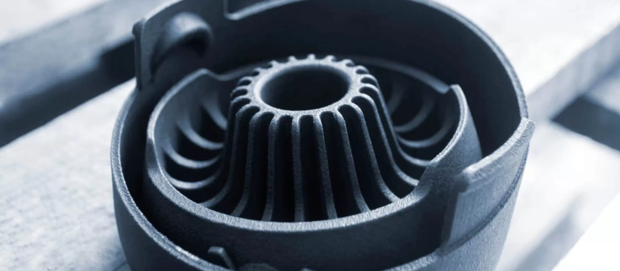 Close-up of a black 3D printed plastic component