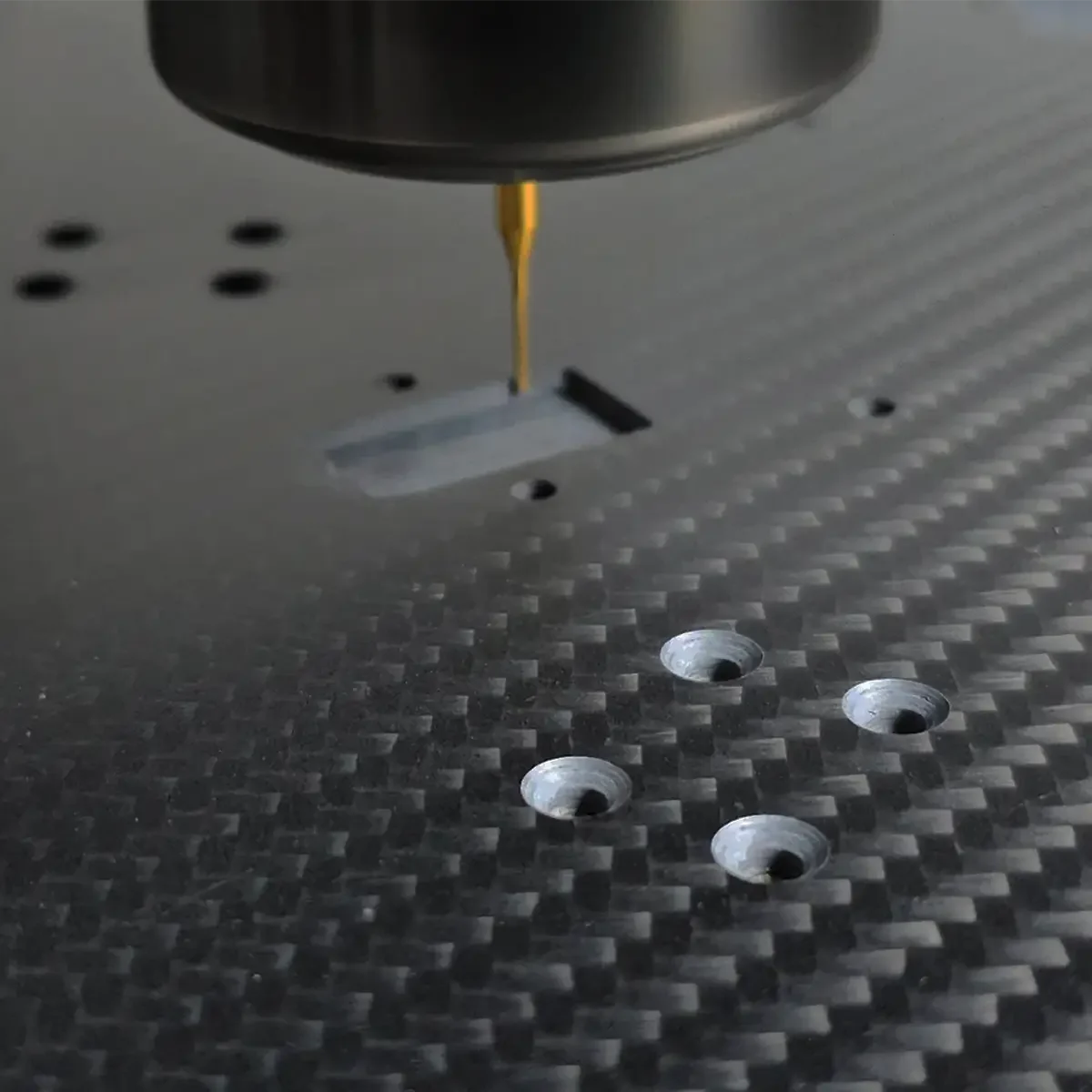 Close-up CNC machining carbon fiber material